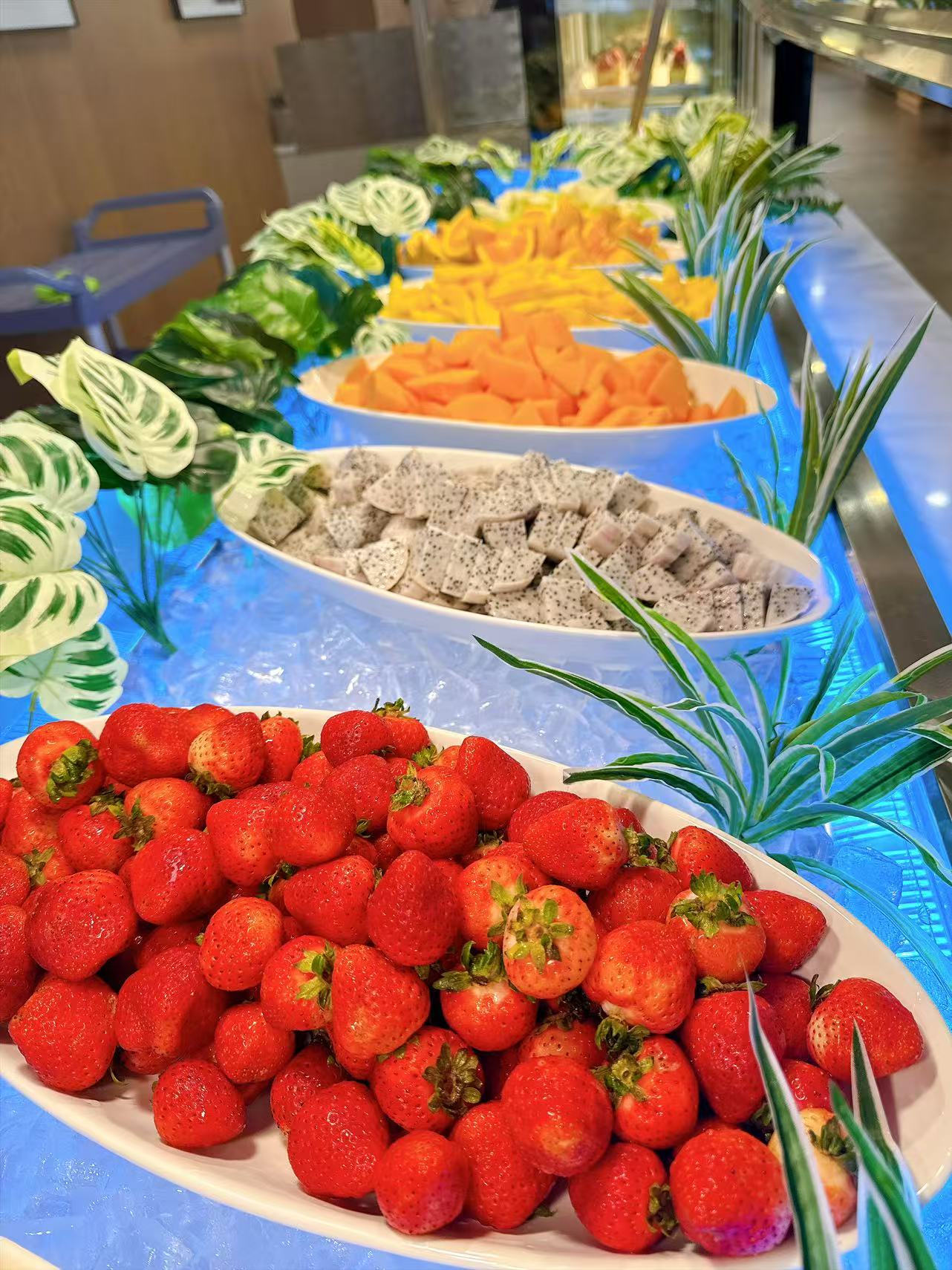 Fresh fruit selection with strawberries and dragon fruit
